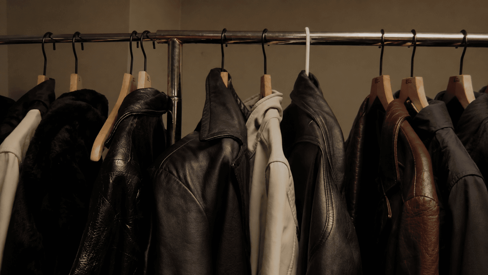 A rack of leather jackets — Luxus International